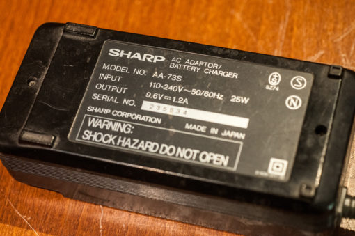 Sharp Videocamera battery charger Model AA-73s