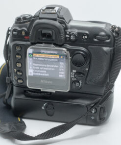 Nikon D200 + battery pack + 2 Batteries + 4GB CF card